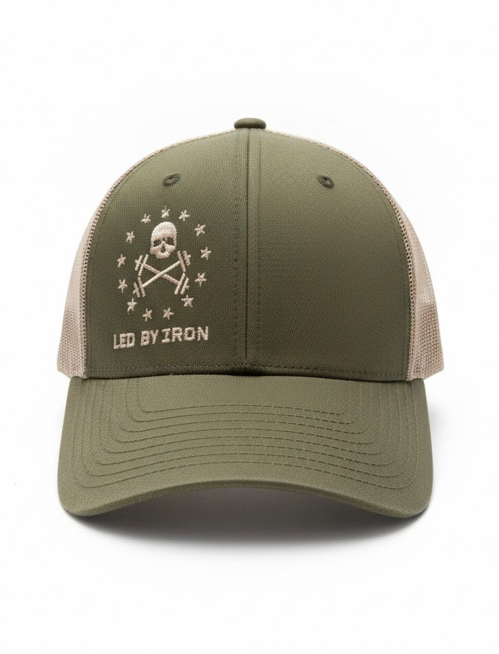 Green and beige cap with a skull and crossbones design on a white background