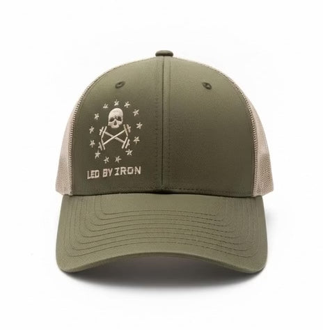 Green and beige cap with a skull and crossbones design on a white background 360 degree video