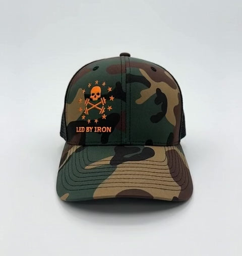 Camouflage baseball cap with skull and crossbones design and 'Led by Iron' text on a white background 360 video